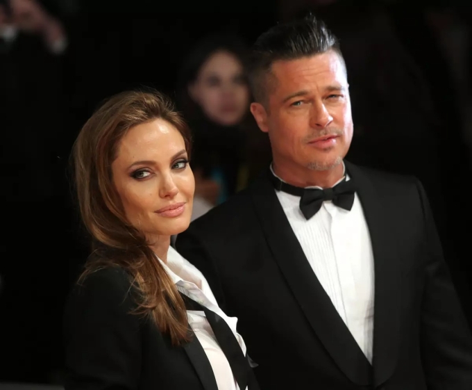 Brad Pitt và Angelina Jolie tham gia sự kiện năm 2014. Ảnh: AP
