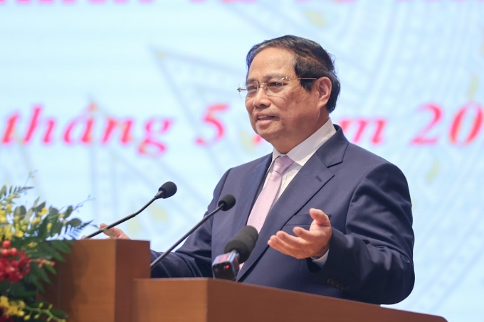 Thủ tướng Phạm Minh Chính phát biểu tại cuộc gặp các doanh nghiệp, hiệp hội, ngày 31/5. Ảnh: VGP