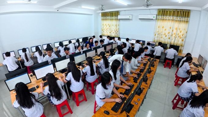 Giờ tin học của học sinh cơ sở 5 trường Trần Cao Vân tại 41 Giang Cự Vọng, Phường Trung Mỹ Tây, TP HCM. Ảnh: Trọng Tín