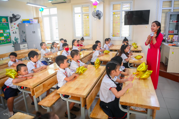 Học sinh lớp 1 Trường tiểu học Thăng Long, quận Ba Đình, Hà Nội tựu trường, tháng 8/2022. Ảnh: Giang Huy