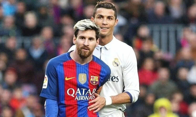 Ronaldo (phải) và Messi, thời còn khoác áo Real Madrid và Barca chơi tại Tây Ban Nha năm 2016. Ảnh: Reuters
