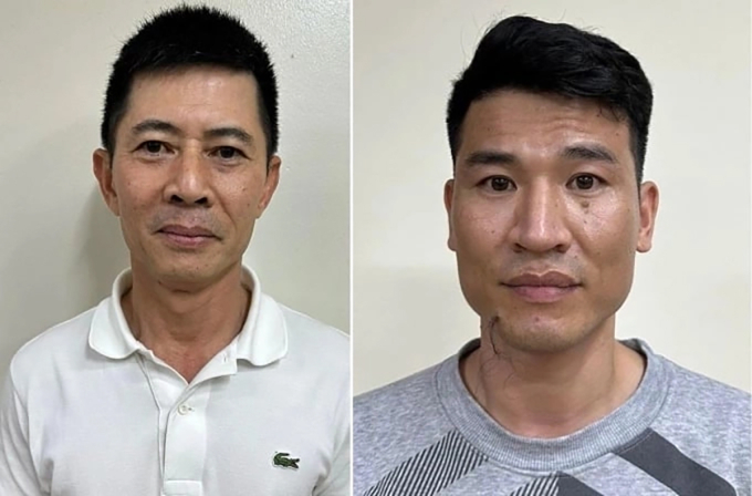 Chủ tịch Nguyễn Duy Hưng (áo trắng) và cấp dưới Trần Anh Quang tại cơ quan điều tra. Ảnh: Bộ Công an