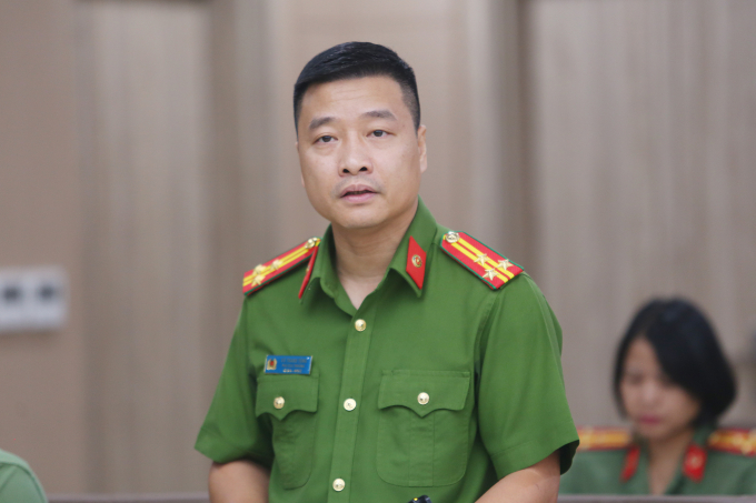 Thượng tá Vũ Thanh Tùng, cục phó C03 tại họp báo. Ảnh: Phạm Dự