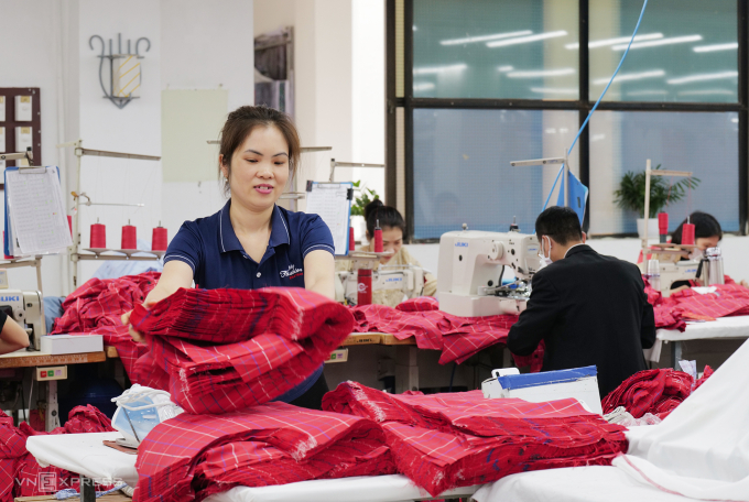 Đề xuất tăng lương tối thiểu cao nhất 350.000 đồng - 1