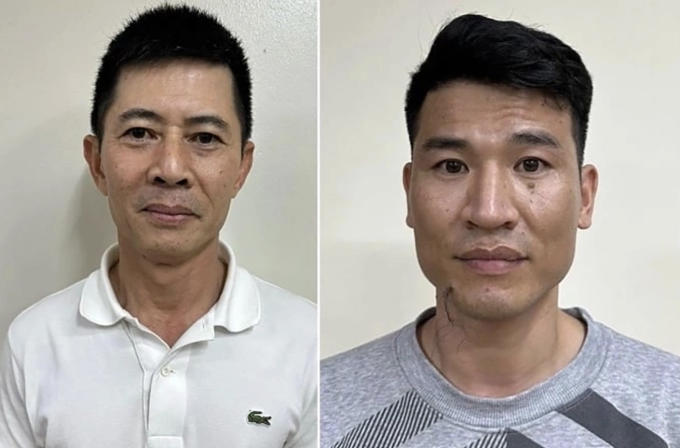 Chủ tịch Nguyễn Duy Hưng (áo trắng) và cấp dưới Trần Anh Quang tại cơ quan điều tra. Ảnh:Bộ Công an