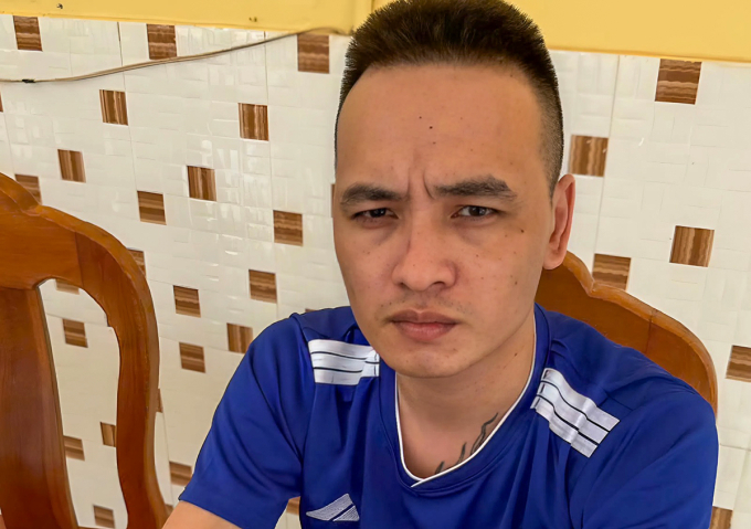 Nghi can Dũng tại cơ quan điều tra. Ảnh: Hòa Vang