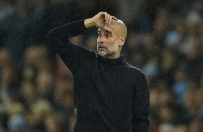 Guardiola chỉ đạo Man City ở trận thua Tottenham 0-4 ngày 24/11/2024. Ảnh: AP