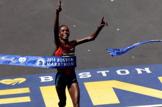 Jeptoo về nhất Boston Marathon 2014 với thành tích kỷ lục của giải, nhưng bị hủy kết quả vì doping. Ảnh: Boston Globe