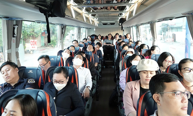 Cán bộ từ khu vực Bình Dương lên trụ sở ở TP HCM làm việc. Ảnh: An Phương