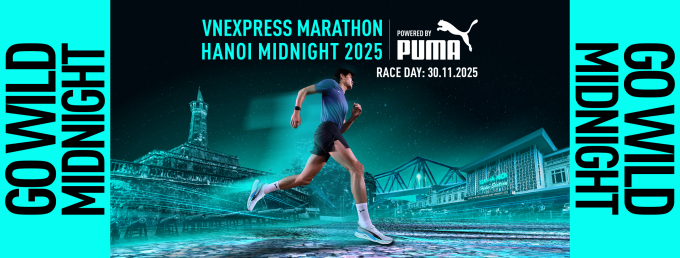 Banner thông báo hợp tác giữa VnExpress Marathon và Puma ở giải chạy đêm Hà Nội. Ảnh: VnExpress Marathon Hanoi Midnight powered by Puma