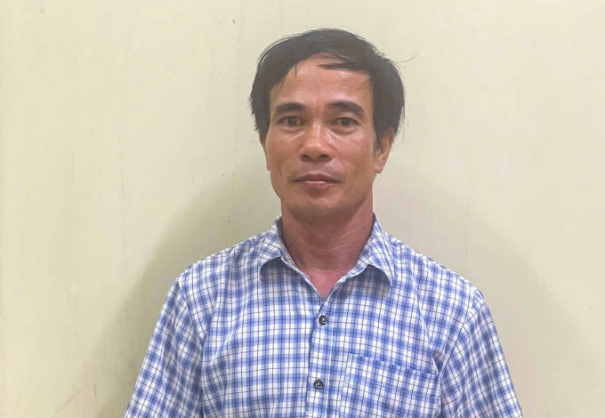 Nguyễn Văn Hòa tại cơ quan điều tra. Ảnh: Hùng Lê